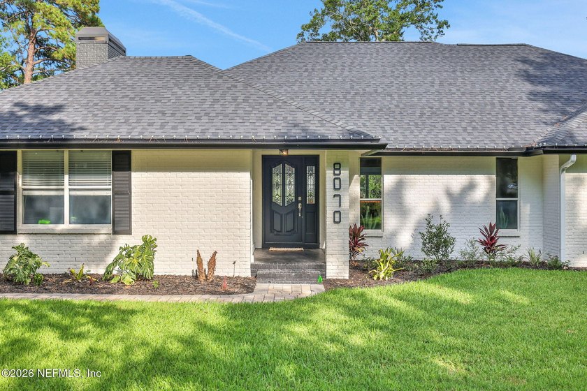 Luxury redefined! This fully modernized single-story gem in - photo 2
