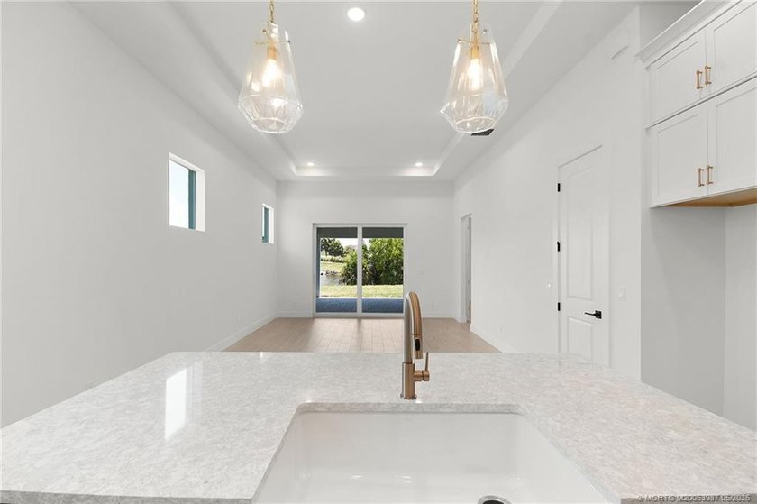 Move-in ready, NEW construction by TRUST HOMES. This 3/2/2/ lake - photo 7