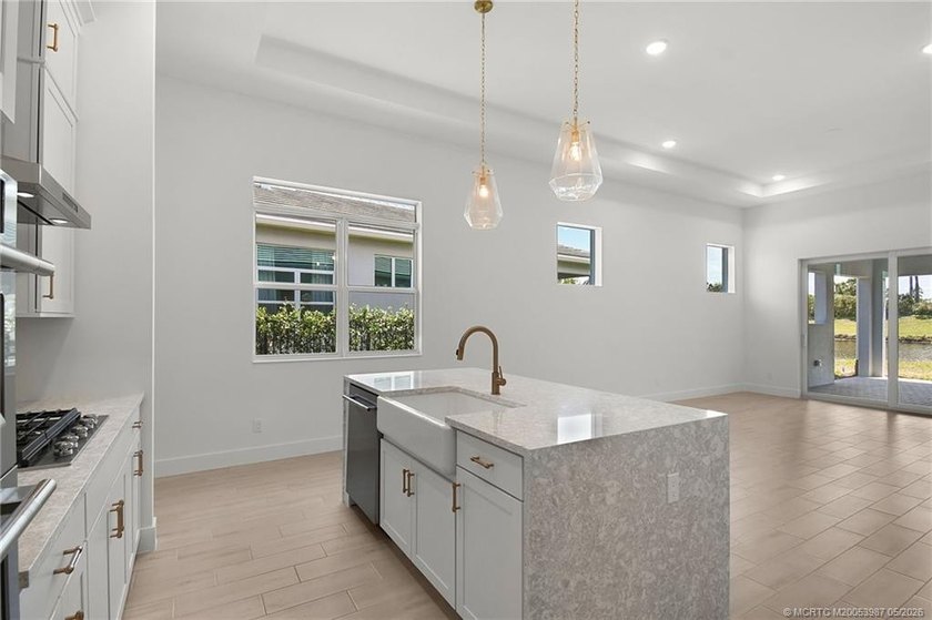 Move-in ready, NEW construction by TRUST HOMES. This 3/2/2/ lake - photo 8