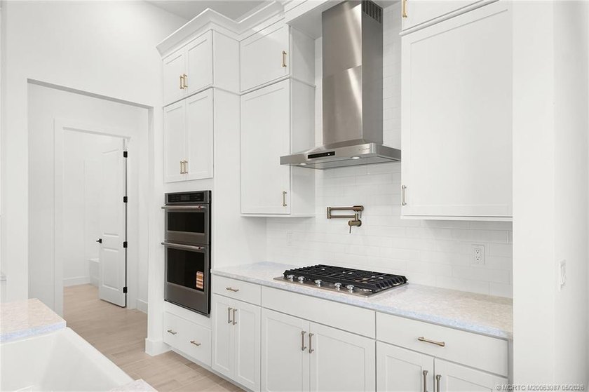 Move-in ready, NEW construction by TRUST HOMES. This 3/2/2/ lake - photo 10