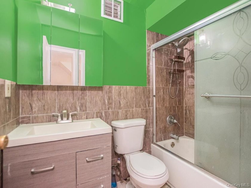 Well-maintained two-family duplex built in 1996, offering - photo 5