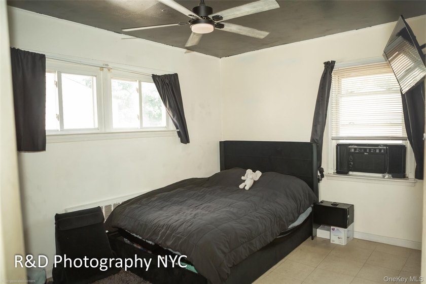 This 6 bedroom, 3-bathroom home features a cozy wood-burning - photo 12