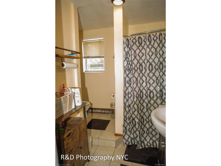 This 6 bedroom, 3-bathroom home features a cozy wood-burning - photo 14