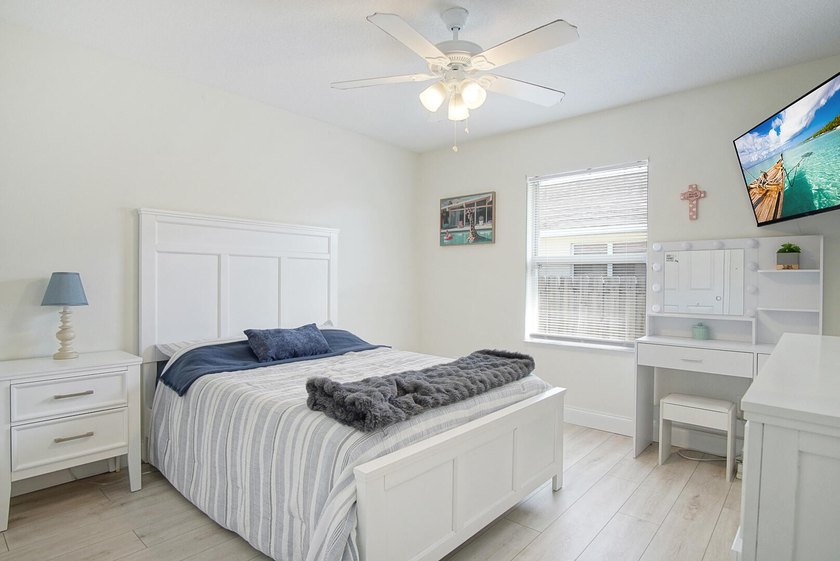 This stunning pool home has it all! Gorgeous plank tile flooring - photo 17