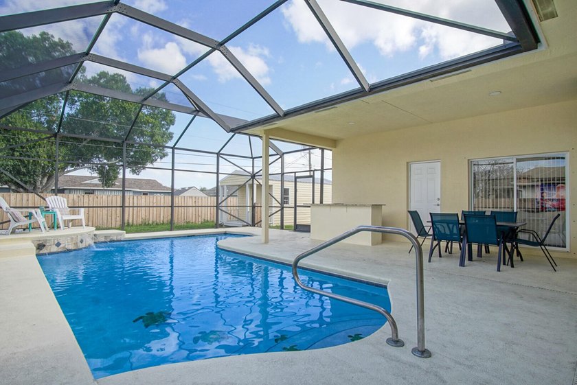 This stunning pool home has it all! Gorgeous plank tile flooring - photo 25