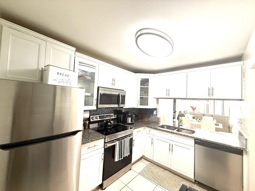 Welcome to this two-bedroom, two-bathroom condominium located in - photo 18