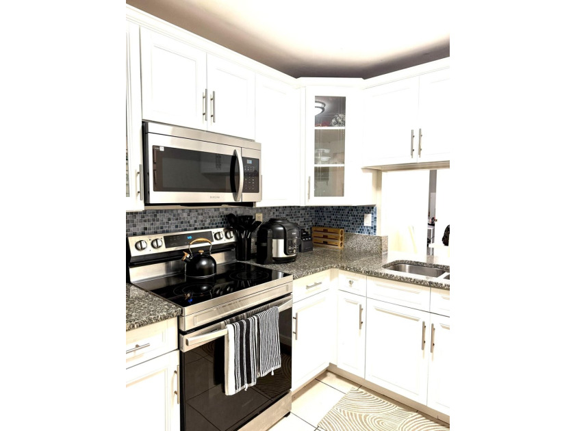 Welcome to this two-bedroom, two-bathroom condominium located in - photo 23