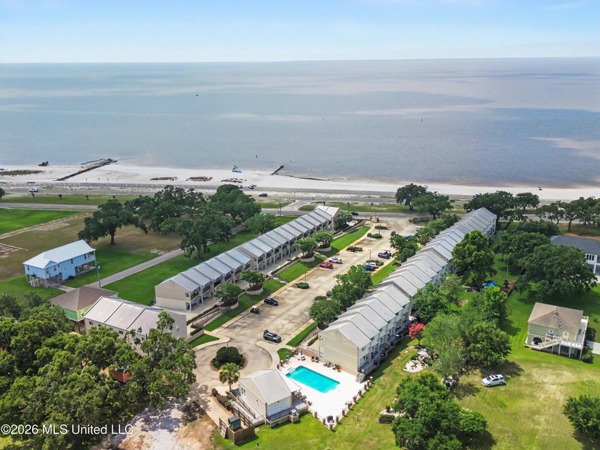 Welcome to Beau Clair Condominium, where coastal elegance meets - photo 3