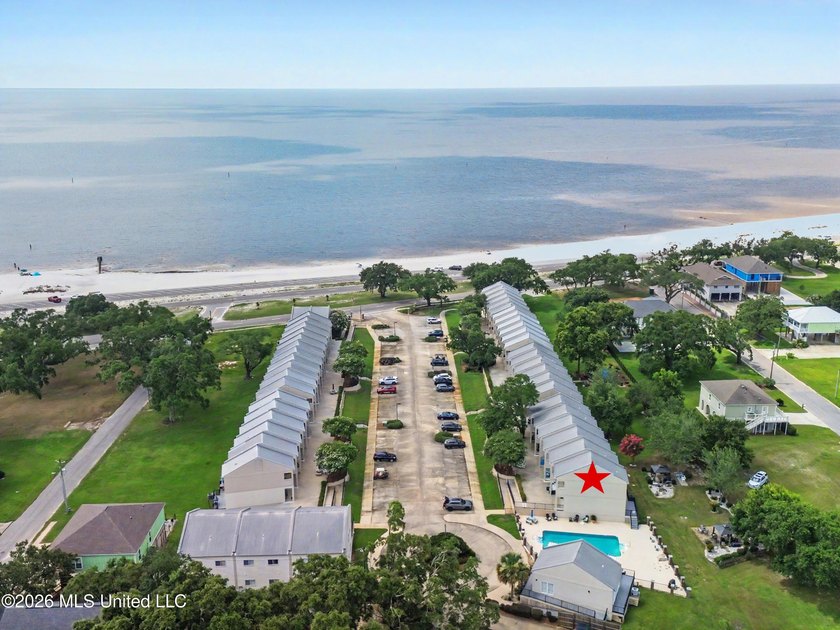 Welcome to Beau Clair Condominium, where coastal elegance meets - photo 4