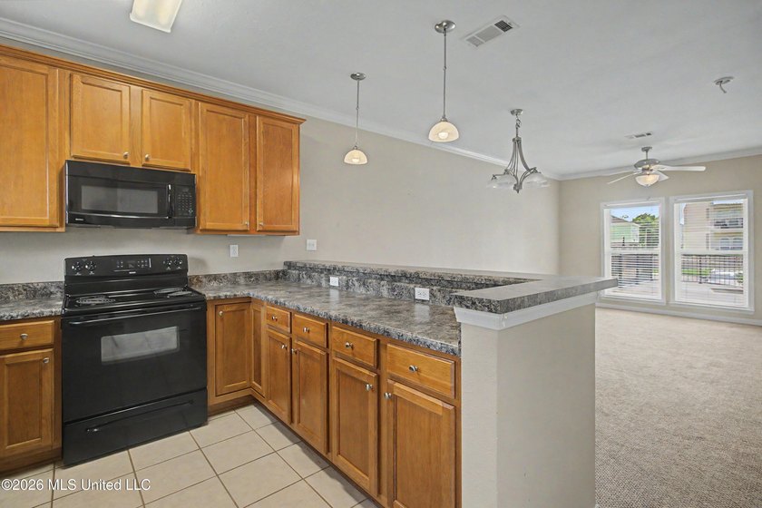 Welcome to Beau Clair Condominium, where coastal elegance meets - photo 7