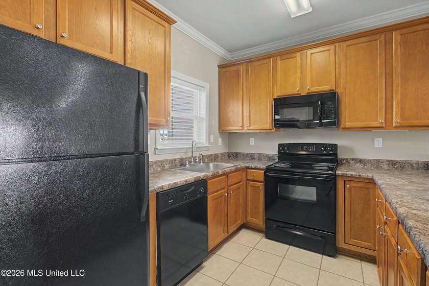 Welcome to Beau Clair Condominium, where coastal elegance meets - photo 9