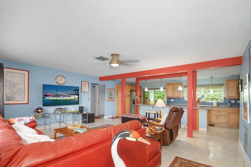 Mid-century modern charm abounds in this CBS home that features - photo 3