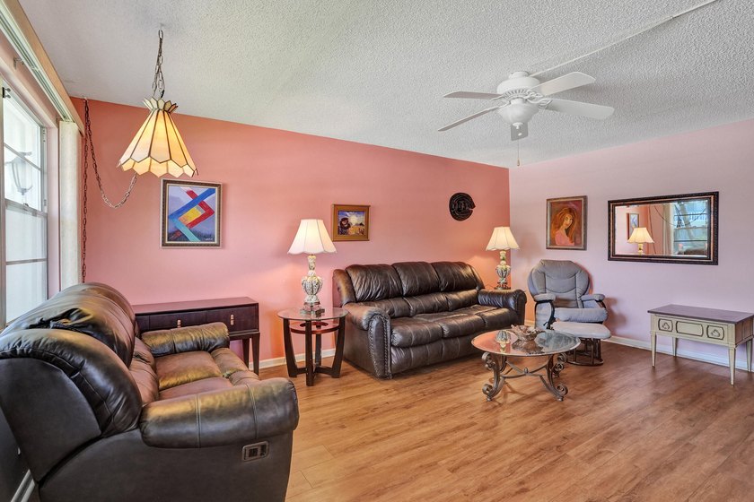 Private, first floor corner unit, furnished 2 bedroom/1.5 bath - photo 2