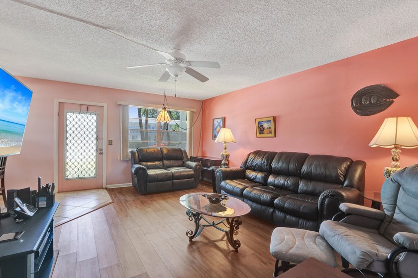 Private, first floor corner unit, furnished 2 bedroom/1.5 bath - photo 4