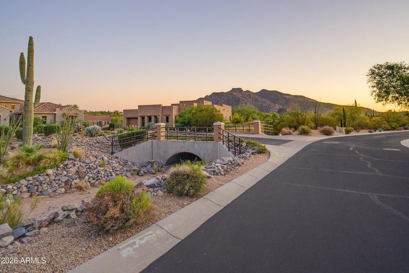 Experience Arizona luxury living in the prestigious gated - photo 3