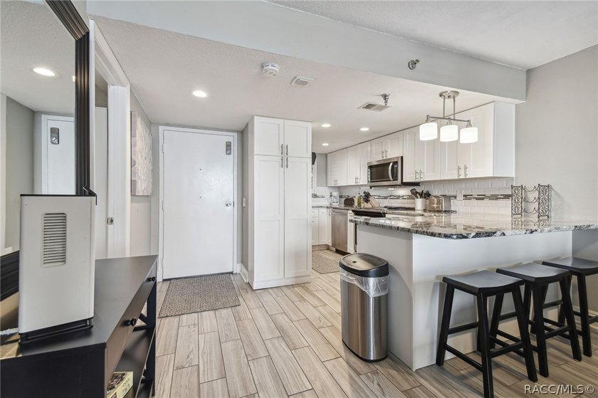 Income-producing coastal condo with a proven rental history! - photo 5