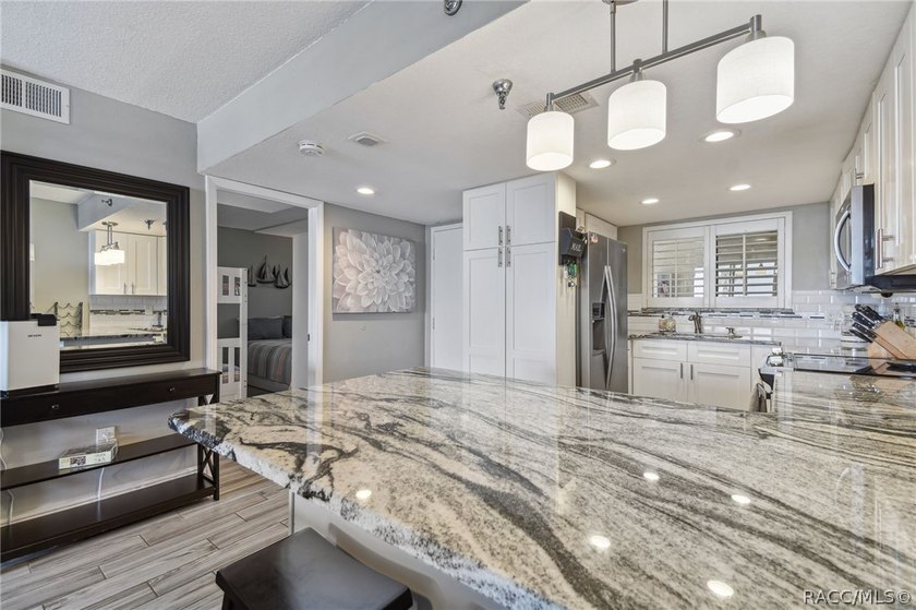 Income-producing coastal condo with a proven rental history! - photo 6