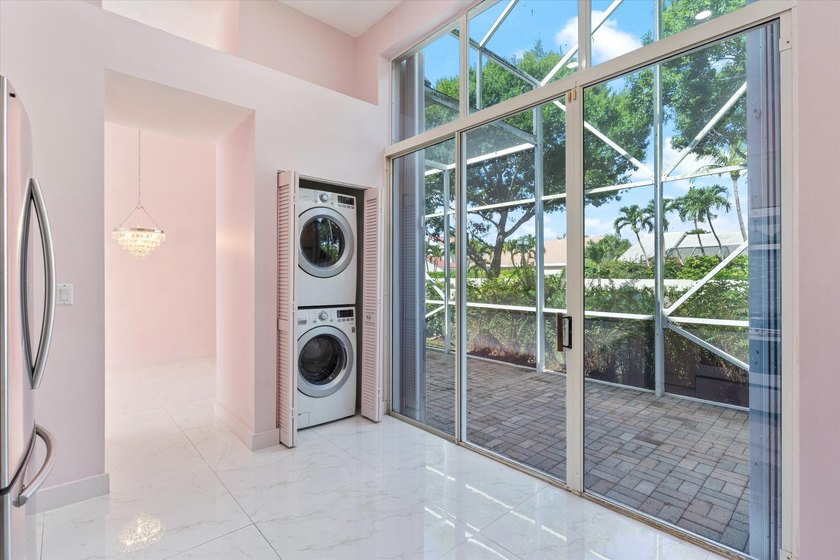 This beautifully renovated 2-bedroom, 2.5-bath townhome offers a - photo 10