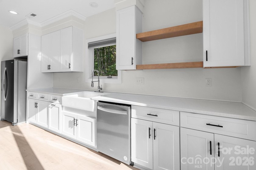 Welcome to lakeview living at it's finest! Built in 2023, this - photo 13