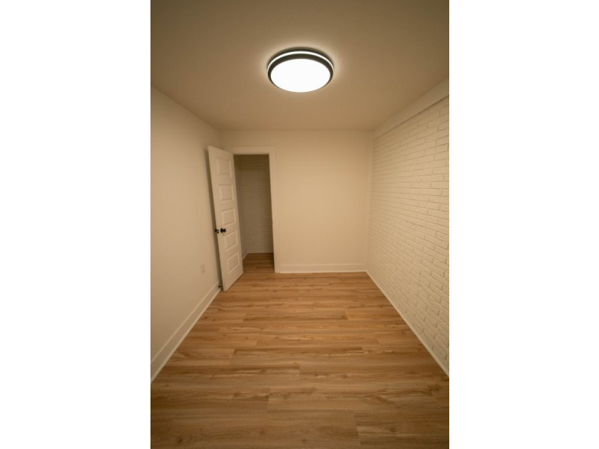 Totally remodeled - new roof, flooring, paint, appliances - photo 23