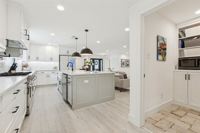 Welcome to 411 Ridgewood Dr, a fully reimagined 5-bedroom, 3 - photo 12