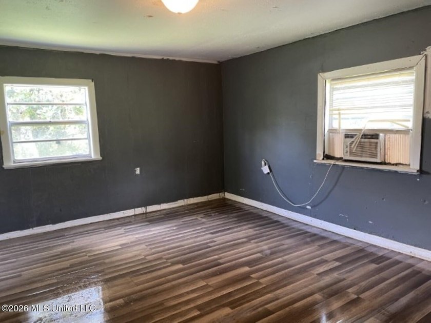 Potential awaits on this one-acre corner lot. The layout - photo 4