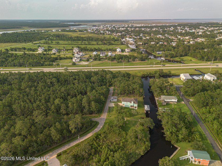 This is the one, a beautiful double lot on the canal located on - photo 7