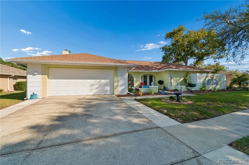 Welcome to this beautifully updated 4-bedroom, 2-bath pool home - photo 2