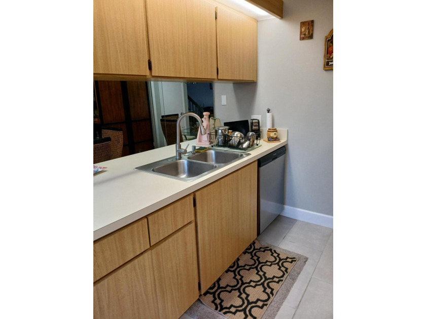 Centrally located large townhome with tile on 1st floor, wood on - photo 8
