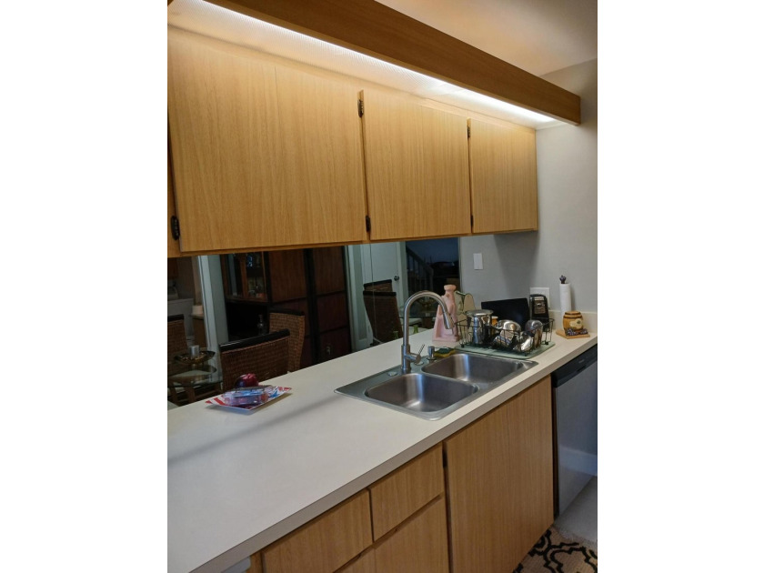 Centrally located large townhome with tile on 1st floor, wood on - photo 9