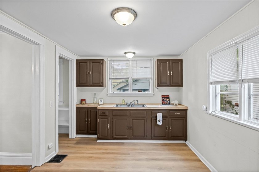 OPPORTUNITY! Welcome to this charming home conveniently located - photo 11