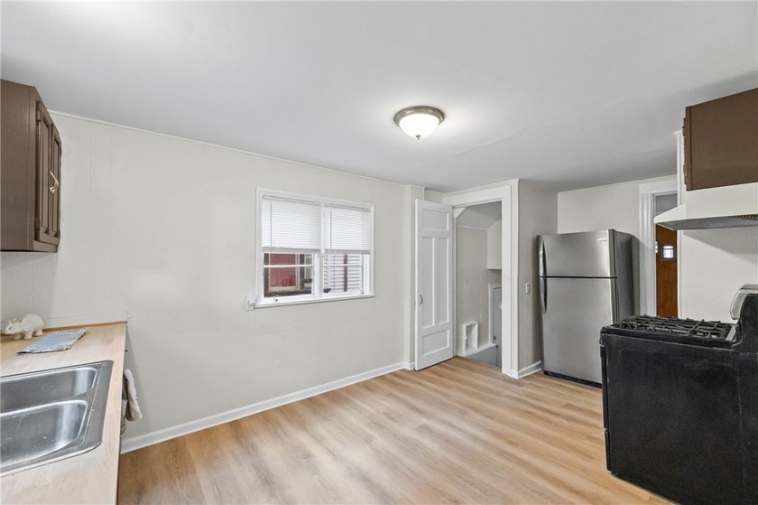 OPPORTUNITY! Welcome to this charming home conveniently located - photo 12
