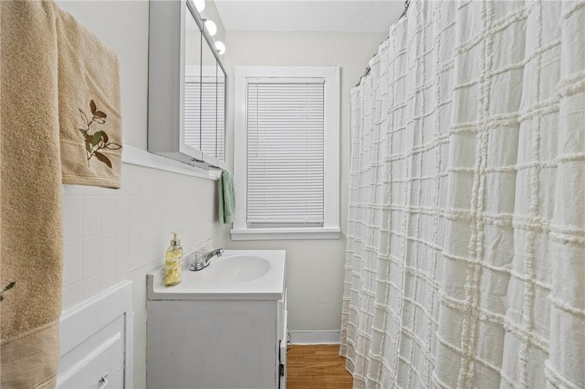 OPPORTUNITY! Welcome to this charming home conveniently located - photo 18