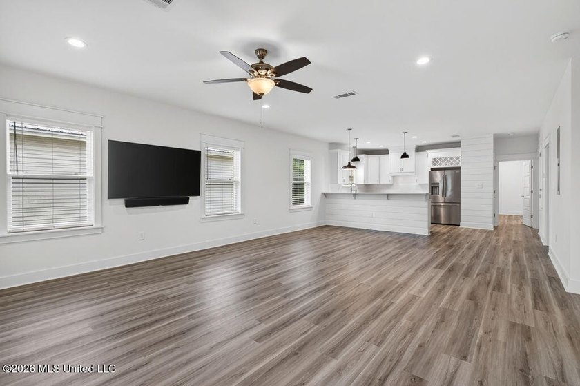Enjoy living in the heart of Downtown Pass Christian. This - photo 8