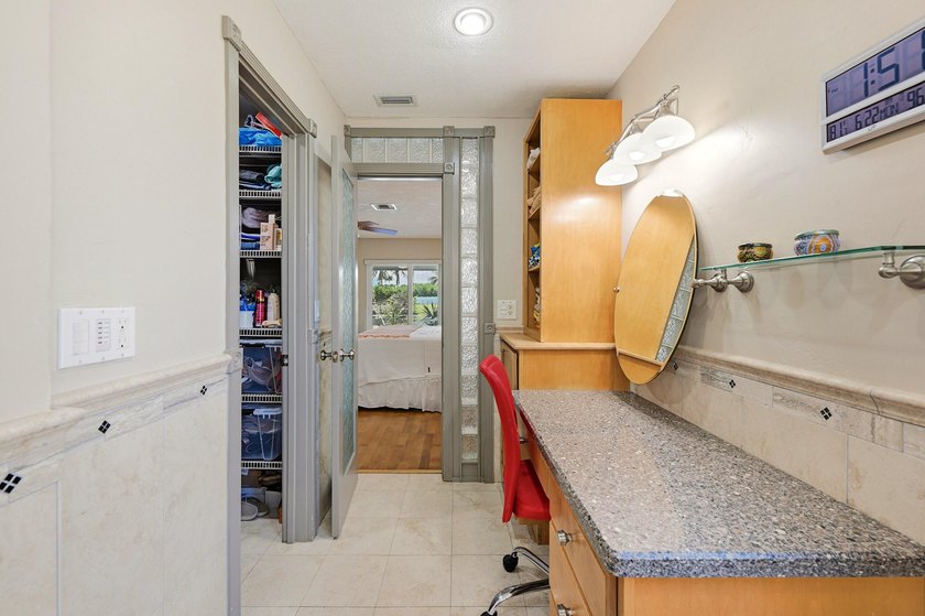 This well-maintained 3-bed, 2-bath CBS pool home sits on one of - photo 14