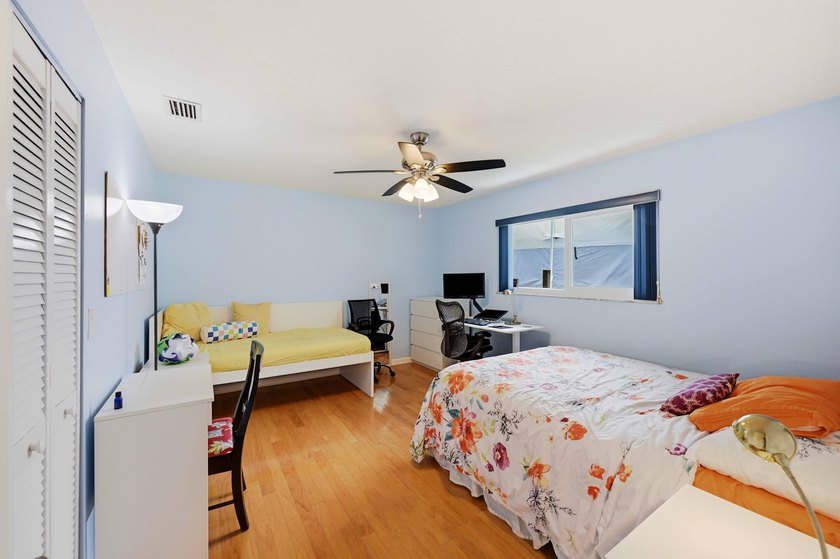 This well-maintained 3-bed, 2-bath CBS pool home sits on one of - photo 15