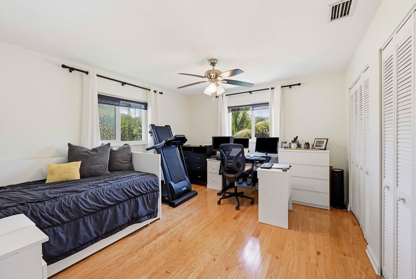 This well-maintained 3-bed, 2-bath CBS pool home sits on one of - photo 16