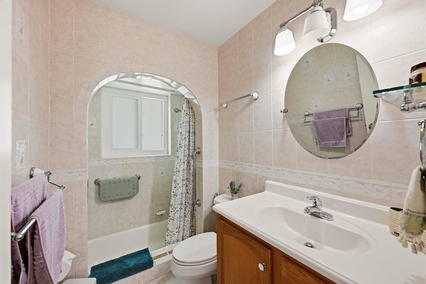 This well-maintained 3-bed, 2-bath CBS pool home sits on one of - photo 17