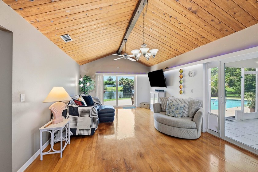 This well-maintained 3-bed, 2-bath CBS pool home sits on one of - photo 26