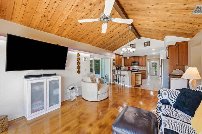 This well-maintained 3-bed, 2-bath CBS pool home sits on one of - photo 28