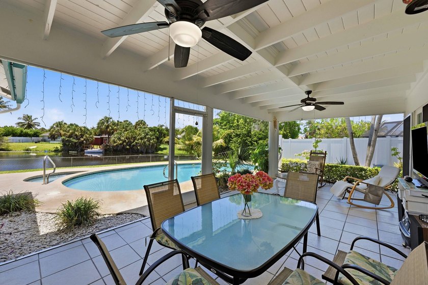 This well-maintained 3-bed, 2-bath CBS pool home sits on one of - photo 30