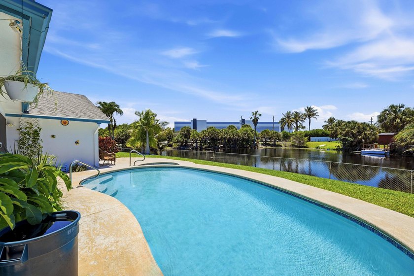 This well-maintained 3-bed, 2-bath CBS pool home sits on one of - photo 32