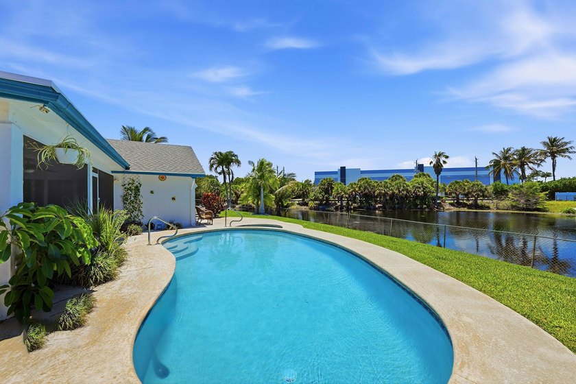 This well-maintained 3-bed, 2-bath CBS pool home sits on one of - photo 33