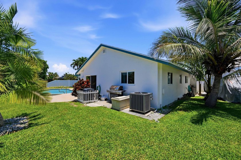 This well-maintained 3-bed, 2-bath CBS pool home sits on one of - photo 38