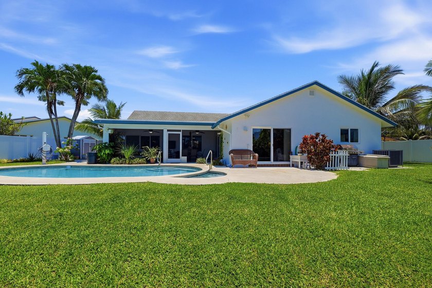This well-maintained 3-bed, 2-bath CBS pool home sits on one of - photo 41