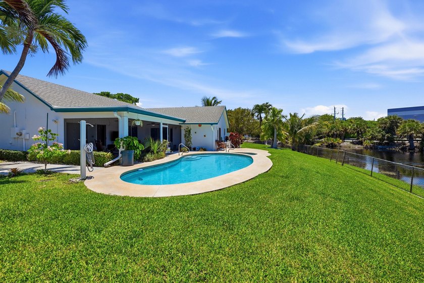 This well-maintained 3-bed, 2-bath CBS pool home sits on one of - photo 42