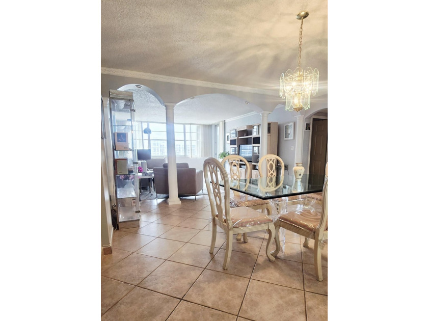 Live on the sand in this pristine oceanfront property featuring - photo 9