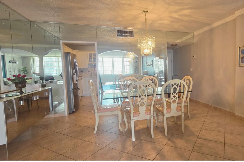 Live on the sand in this pristine oceanfront property featuring - photo 10