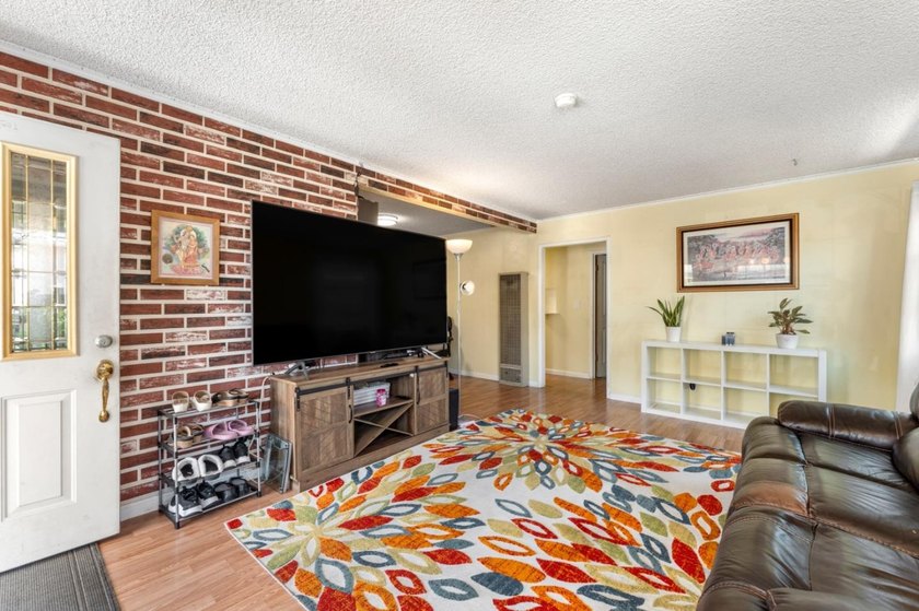 Welcome to 123 Gardenia Way in East Palo Alto, a spacious and - photo 5