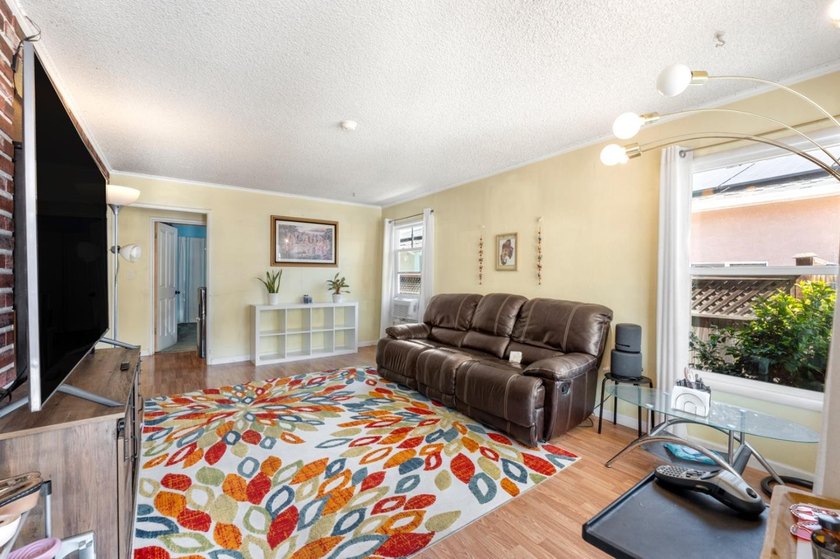 Welcome to 123 Gardenia Way in East Palo Alto, a spacious and - photo 6